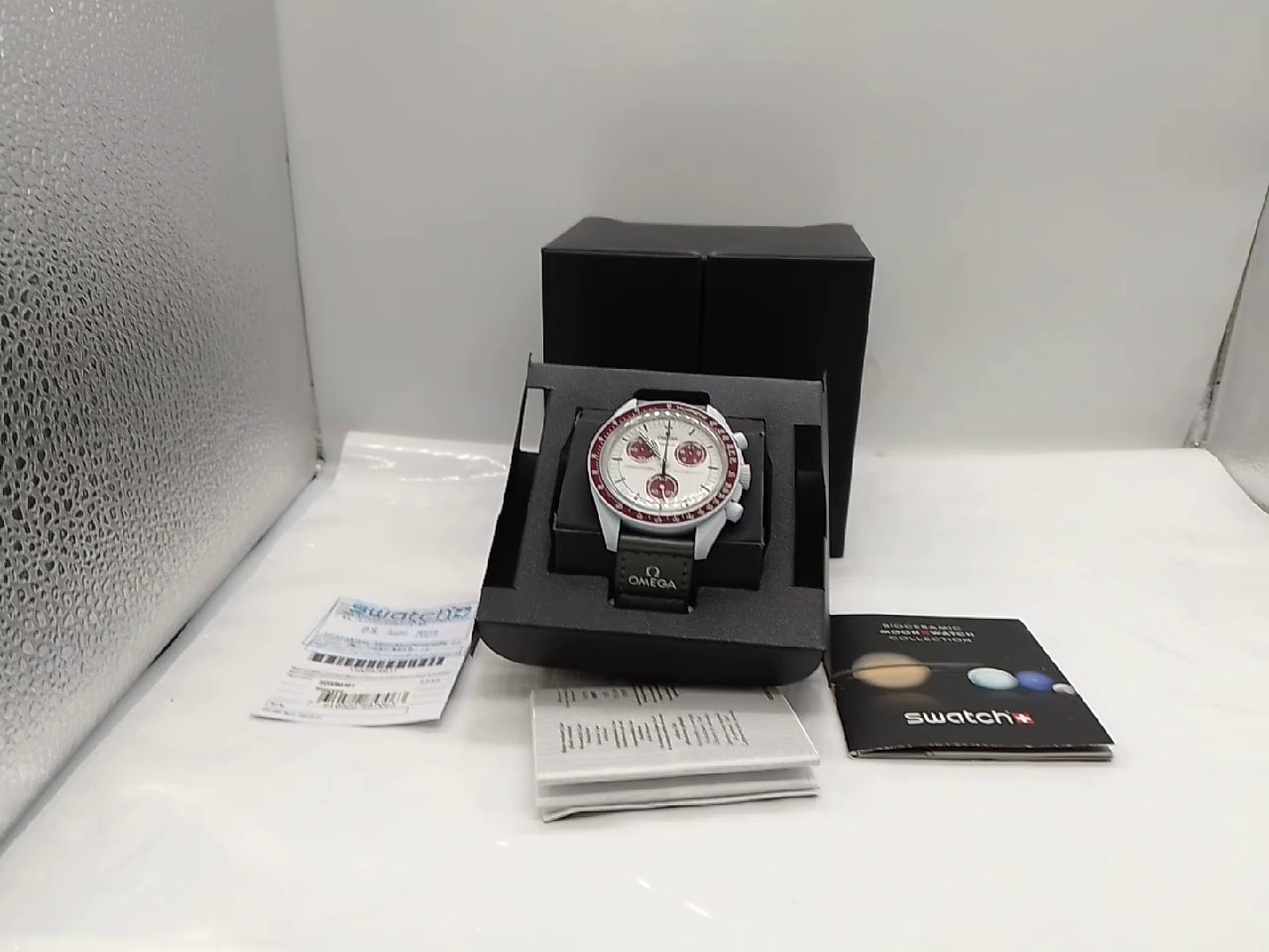 Omega Moonswatch Mission To Pluto | mit Originalverpackung | kratzer am Glas | Zustand: Gut