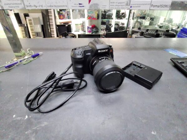 Sony Alpha 200 | mit Objektiv 18-70 | mit 1 Akku und Ladegerät | Zustand: Gut – Bild 2