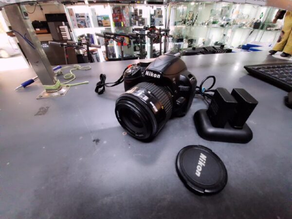 Nikon D3100 mit Objektiv Nikkor 35-70mm | 2 Akkus+ mit Ladegerät | Zustand: Gut – Bild 2
