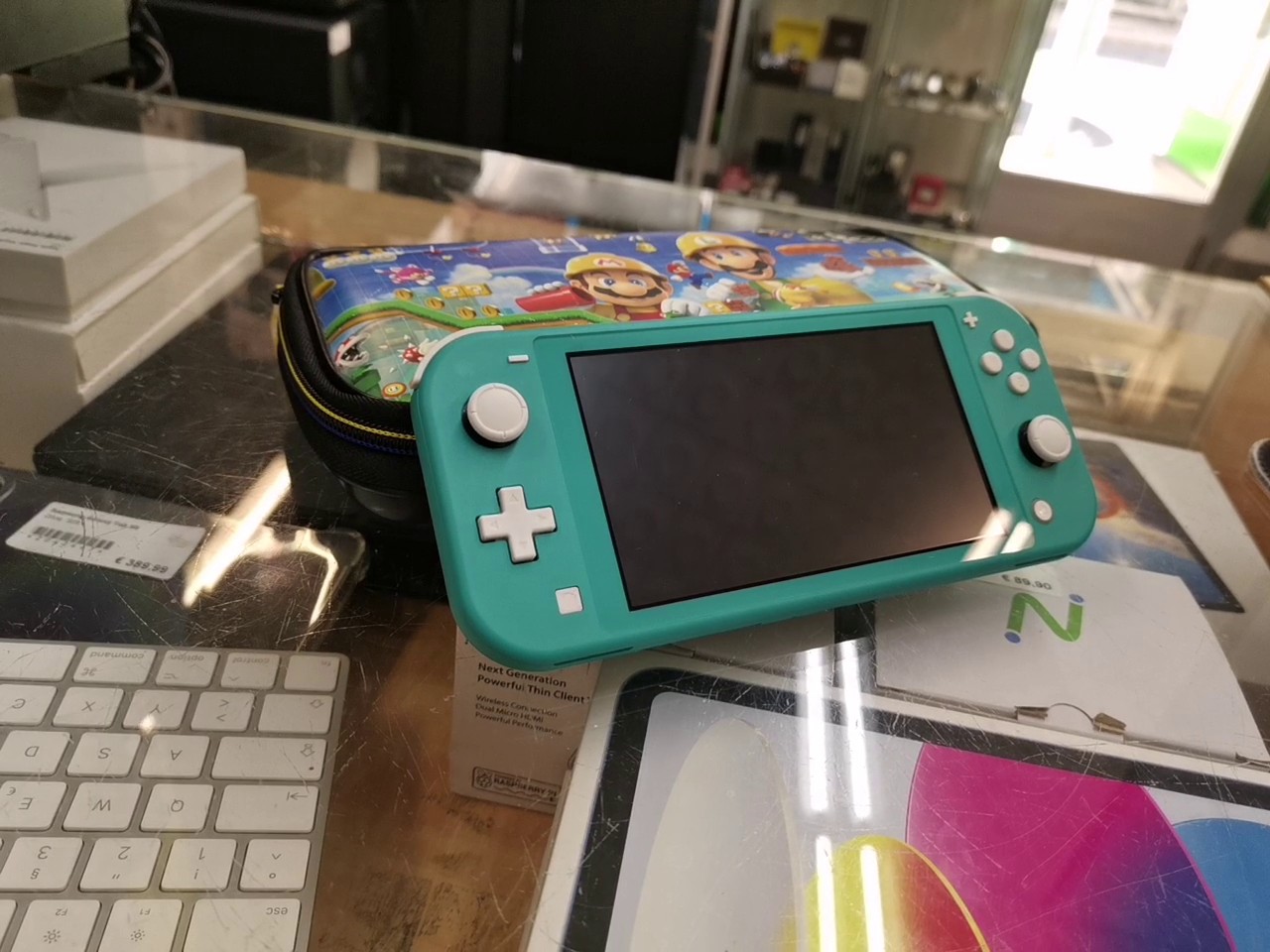 Nintendo Switch Lite türkis | mario hülle Mit ladegerät | Zustand: Sehr Gut | Farbe: grün – Bild 2