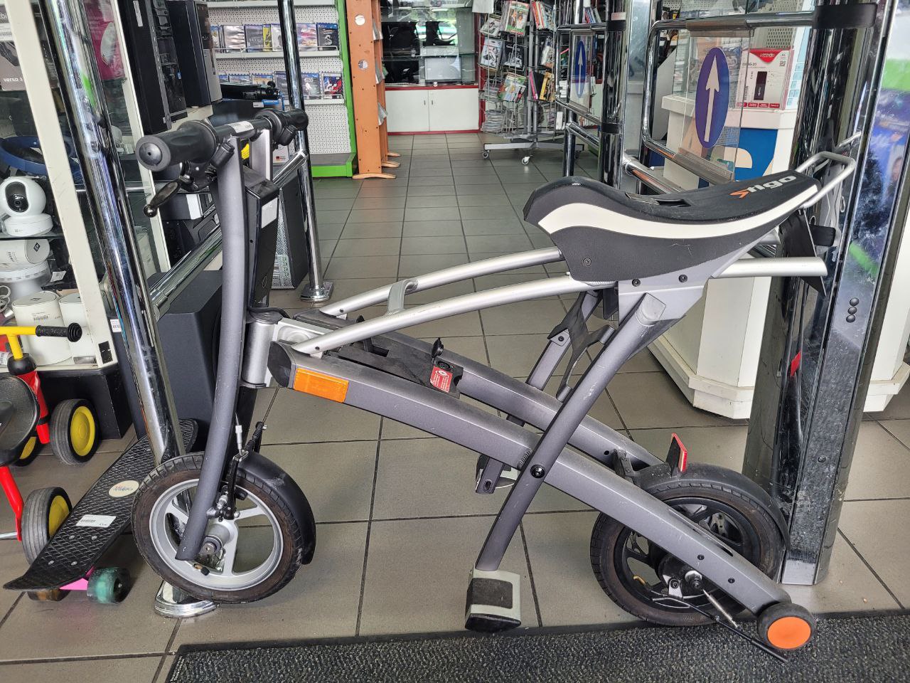 Stigo Klapproller WHSTG001250, Mit Ladegerät. Akku defekt, lässt sich nicht laden. – Bild 3