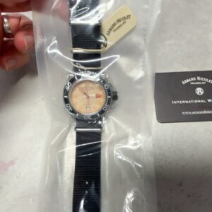 Armand Nicolet  Automatik , Automatik Uhr mit beigem | orangefarbenem Zifferblatt und schwarzem NATO-Armband, OVP. | Zustand: Sehr Gut | Farbe: schwarz