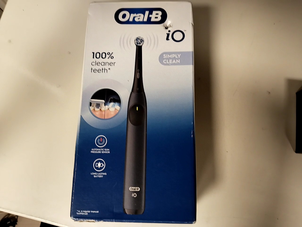 Oral-B iO Simply Clean, Schwarz, Elektrische Zahnbürste mit iO-Technologie, automatischem Andrucksensor, 2-Minuten-Timer und Akku. | Zustand: Neu