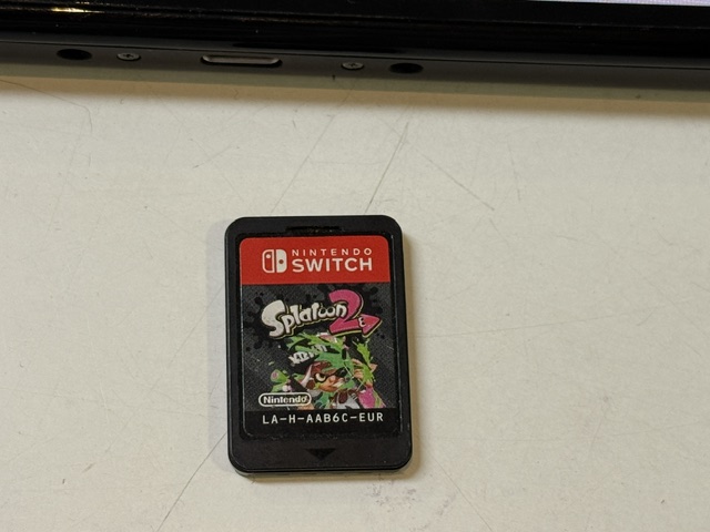 Nintendo Switch OLED Neon-Rot/Neon-Blau, Inkl. Spiel Splatoon 2, Originalverpackung, Dockingstation, Netzteil und HDMI-Kabel. | Zustand: Sehr Gut | Farbe: schwarz – Bild 5