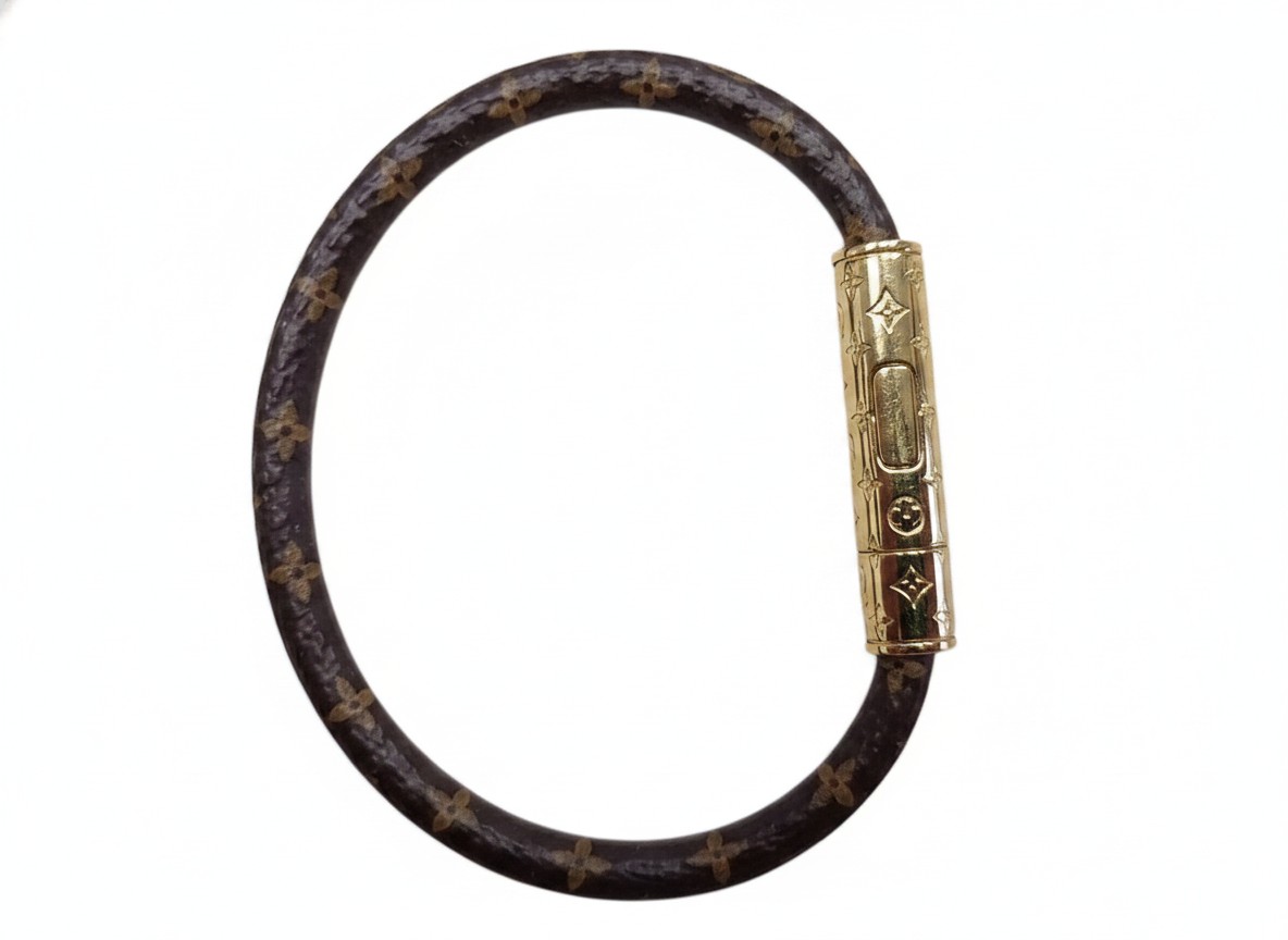 Louis Vuitton Armband Monogram Canvas Gold, Klassisches Armband aus braunem Monogram Canvas mit goldfarbenem Zylinder-Verschluss, inklusive OVP. Rechnung | Zustand: Sehr Gut – Bild 2