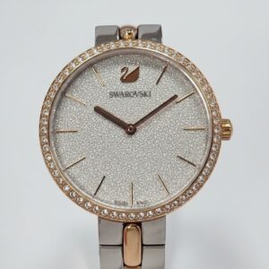 Swarovski Crystalline Damenuhr bicolor, Elegante Quarzuhr mit glitzerndem Zifferblatt, Lünette mit Kristallen, Edelstahl, Swiss Made | Zustand: Sehr Gut