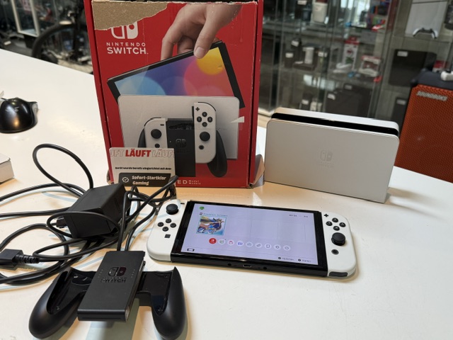 Nintendo Switch OLED Modell Weiß, Inkl. Spiel Pokémon Schwert, Dockingstation, Ladegerät und Originalverpackung | Zustand: Sehr Gut | Farbe: schwarz – Bild 2