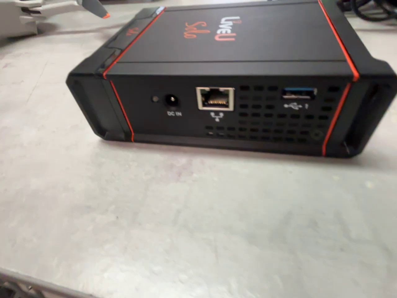 LiveU Solo HDMI, Schwarz/Orange, Mobiler HDMI Video-Encoder für Live-Streaming, keine sichtbaren Schäden | Zustand: Sehr Gut – Bild 4