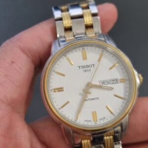 Tissot Automatics III Two-Tone Weiß, Automatikwerk, Saphirglas, Tag-Datum-Anzeige, leichte Kratzer am Gehäuse | Band | Zustand: Gebraucht