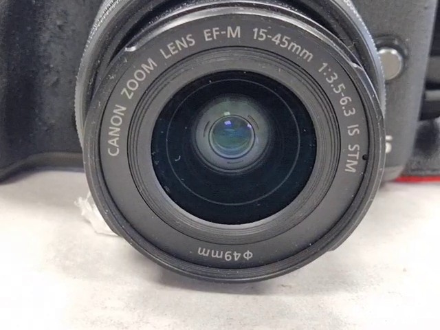 Canon EOS M5 2016 Schwarz, Spiegellose Systemkamera, 24,2 Megapixel, APS-C Sensor, abgenutzter Gummigriff, stark verschmutzt, Zubehör: Trageriemen, 2x Akkus, Ladestation | Zustand: In Ordnung – Bild 4