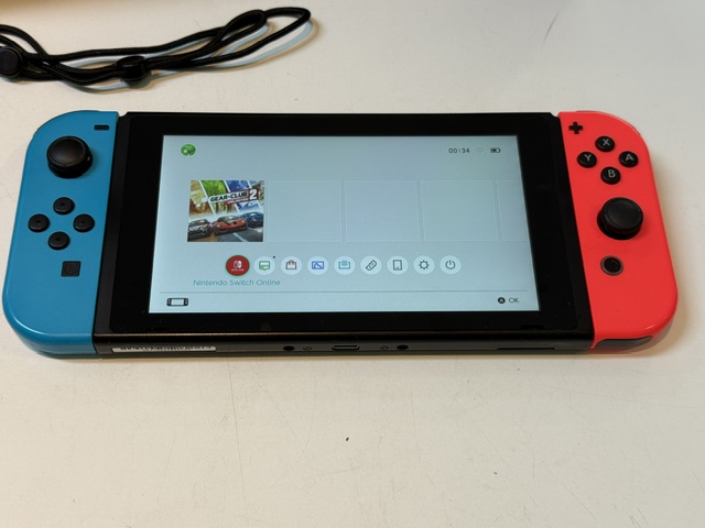 Nintendo Switch V2 Rot Blau 2019, Inklusive Docking-Station, Ladegerät und Mario Kart Schutztasche. | Zustand: Sehr Gut | Farbe: schwarz – Bild 4