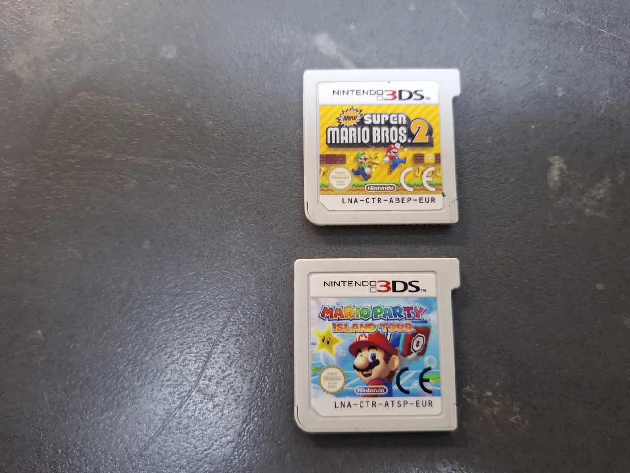 Nintendo 3DS Spiele-Set 10 Stk., 10 originale Nintendo 3DS Spielmodule inklusive Tomodachi Life, Pokémon Moon und Mario Kart 7. | Zustand: Sehr Gut | Farbe: grau – Bild 3