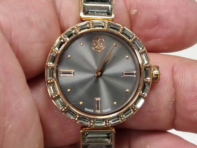Swarovski Matrix Bangle Roségold Grau, Damen Armbanduhr Schweizer Produktion, 25 mm Gehäuse, mit Kristallen im Baguette-Schliff | Zustand: Gut