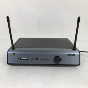 Shure UT4A-FM, UHF-Diversity-Funkempfänger mit 591,125 MHz, inklusive Funkmikrofon und Transportkoffer. | Zustand: Gut