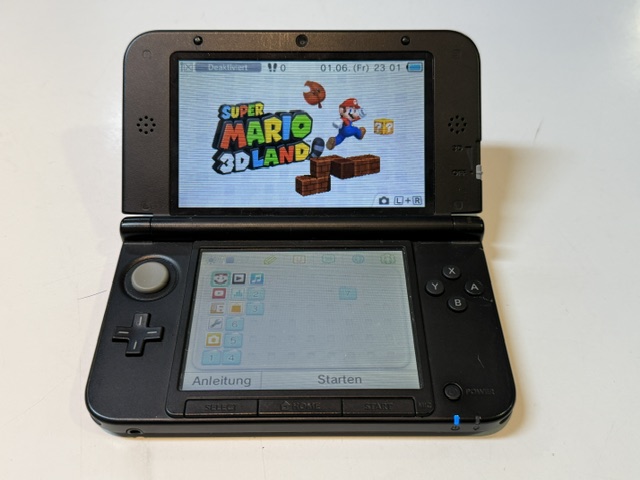 Nintendo 3DS XL Schwarz , Handheld-Spielekonsole in Schwarz inkl. dem Jump-and-Run-Klassiker Super Mario 3D Land. | Zustand: In Ordnung | Farbe: schwarz – Bild 2